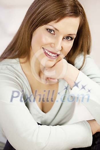 Pretty woman smiling for the camera Pretty woman smiling for the camera