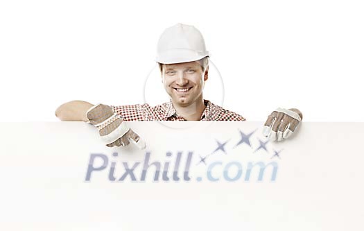 Clipped builder holding a blank white sign Clipped builder holding a blank white sign