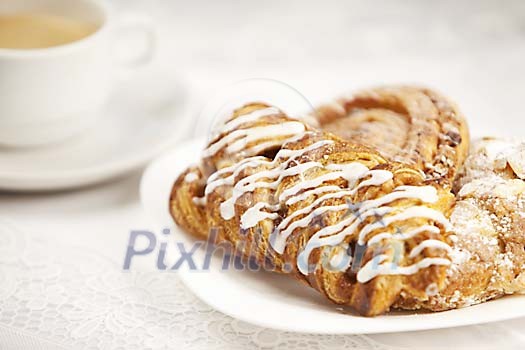 Fresh pastry and cup of coffee Fresh pastry and cup of coffee