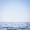 Background image of open sea and clear sky