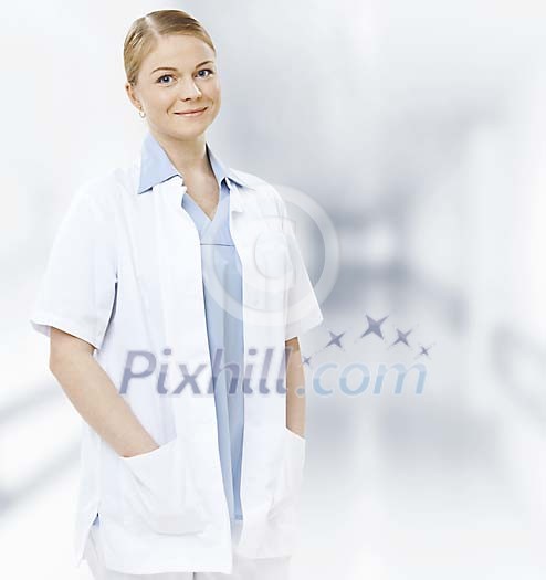 Smiling female doctor standing Smiling female doctor standing