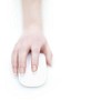 Hand with a computer mouse on a white background