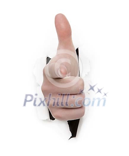 Hand pointing to camera through a hole in the paper Hand pointing to camera through a hole in the paper