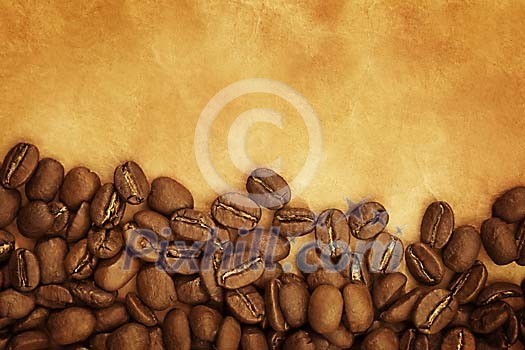 Background of coffee beans on a brown paper Background of coffee beans on a brown paper