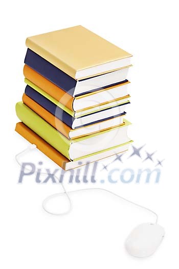 Clipped pile of books with a computer mouse Clipped pile of books with a computer mouse