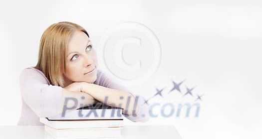 Woman sitting and thinking on books Woman sitting and thinking on books