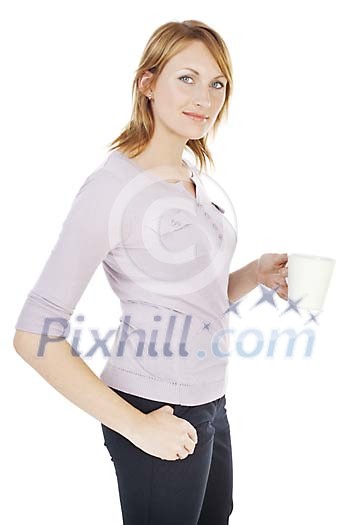Casually dressed woman standing and holding a white cup. Clipping path included Casually dressed woman standing and holding a white cup. Clipping path included