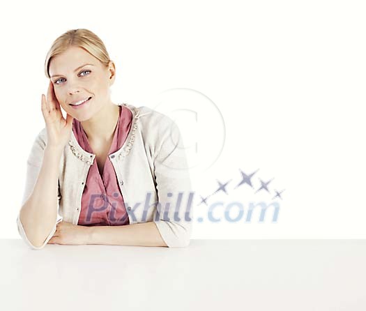 Pretty woman sitting at the desk Pretty woman sitting at the desk