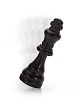 Black chess king falling