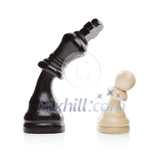 Clipped chess king looking down to the pawn Clipped chess king looking down to the pawn