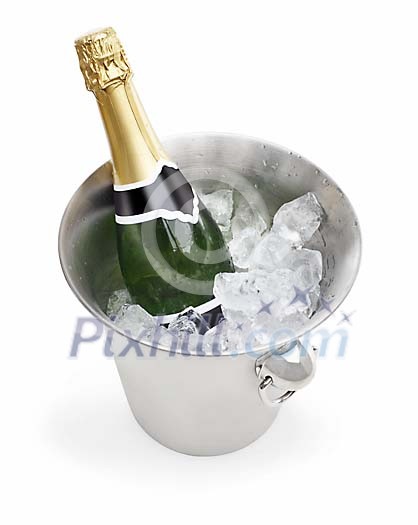 Champagne bottle chilling in the cooler with ice Champagne bottle chilling in the cooler with ice