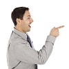 Clipped businessman with a surprised expression pointing his finger