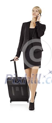 Clipped businesswoman with a suitcase and mobile phone Clipped businesswoman with a suitcase and mobile phone