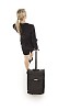 Clipped businesswoman walking away from the camera