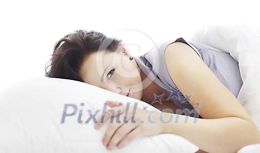 Woman in the bed waking up Woman in the bed waking up