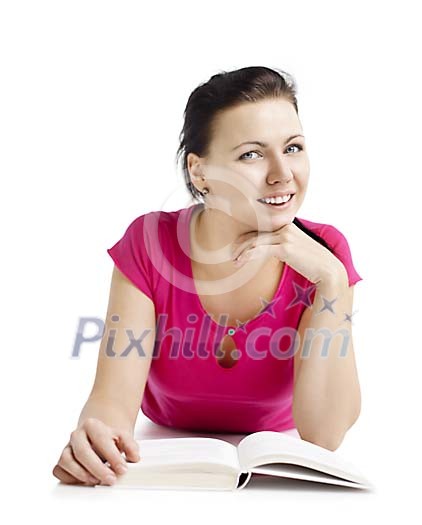 Clipped woman on the floor with a book looking straight at the camera Clipped woman on the floor with a book looking straight at the camera