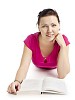 Clipped woman on the floor with a book