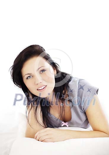 Woman in the bed looking straight to the camera
