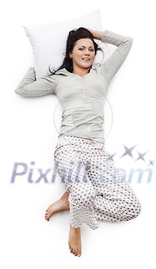 Woman laying on the bed in her pyjamas Woman laying on the bed in her pyjamas