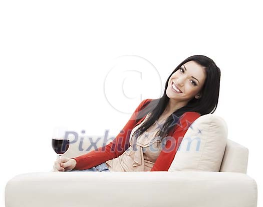 Woman drinking wine on the couch Woman drinking wine on the couch