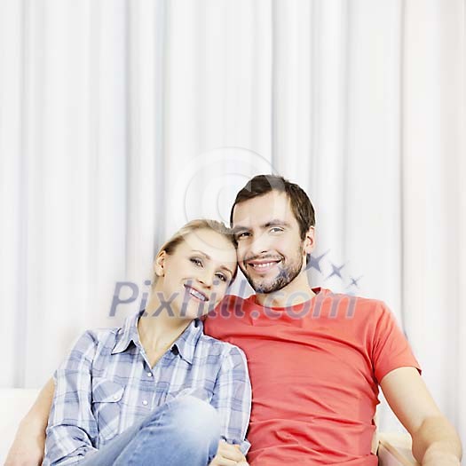 Couple sitting on the sofa Couple sitting on the sofa