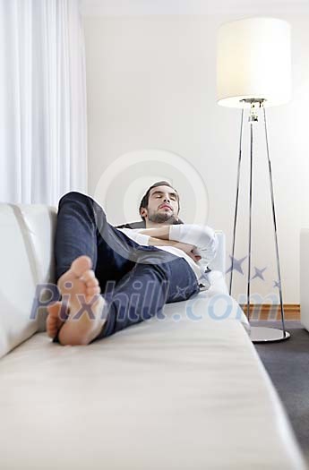 Man sleeping on the sofa Man sleeping on the sofa