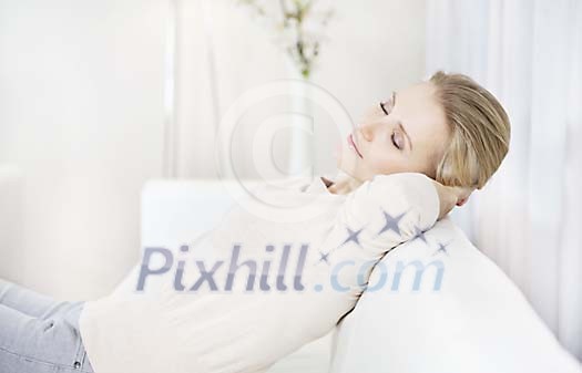 Woman sleeping on the sofa Woman sleeping on the sofa
