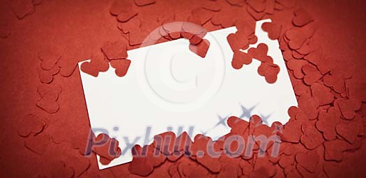 White paper surrounded by red hearts White paper surrounded by red hearts