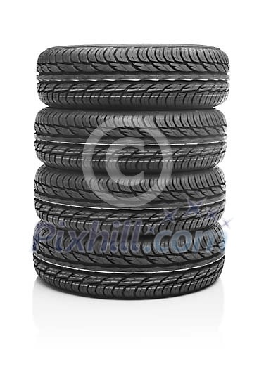 Isolated stack of new tyres Isolated stack of new tyres