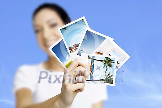 Woman showing vacation photographs Woman showing vacation photographs