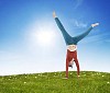 Woman on the grass upside down