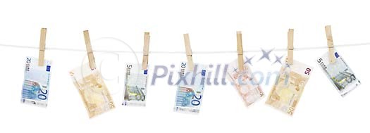 Isolated banknotes hanging on the washing line Isolated banknotes hanging on the washing line