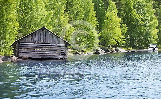 Old wooden house by the lake Old wooden house by the lake