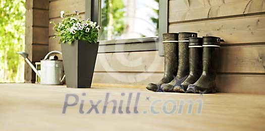 Boots and flowers on the porch Boots and flowers on the porch