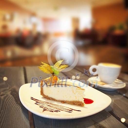 Slice of cake and cup of coffee on the table Slice of cake and cup of coffee on the table