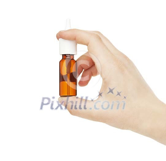Isolated hand holding a nasal spray Isolated hand holding a nasal spray