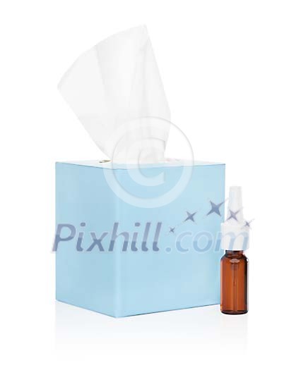 Isolated box of tissues and a nasal spray Isolated box of tissues and a nasal spray
