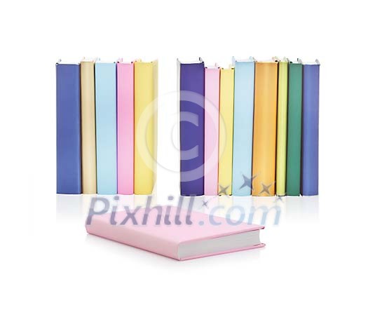 Isolated row of books, one book in front of the row Isolated row of books, one book in front of the row
