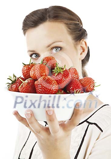 Woman holding a bowl of strawberries Woman holding a bowl of strawberries