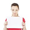 Isolated sad woman holding a blank card
