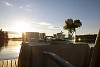 Table set by the water at the sunset