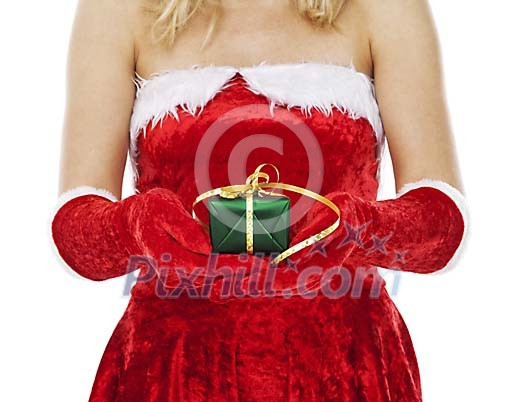 Isolated woman holding a small green gift Isolated woman holding a small green gift