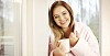 Woman having a cup of tea in the morning