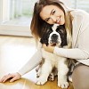 Woman hugging a puppy
