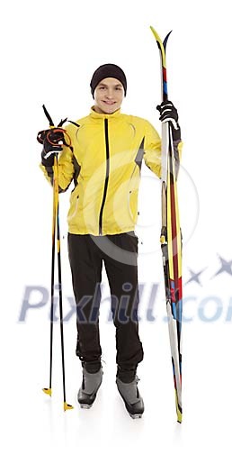 Isolated man standing with skis Isolated man standing with skis