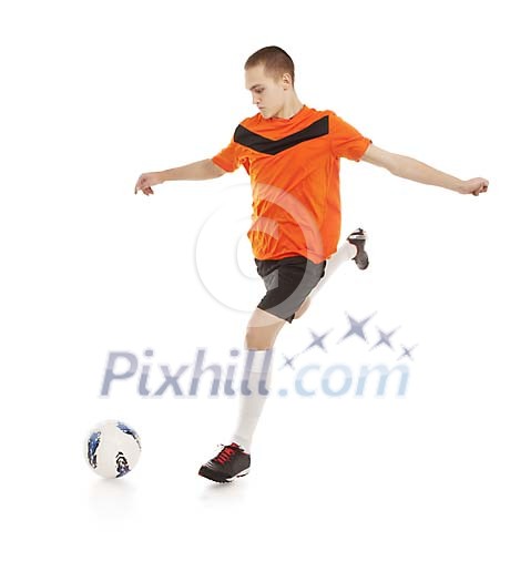 Isolated male footballer going to kick the ball Isolated male footballer going to kick the ball