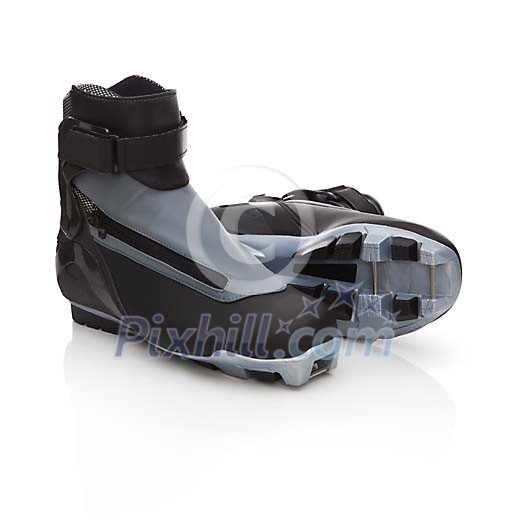 Isolated black skiing boots Isolated black skiing boots