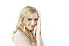 Shy woman smiling