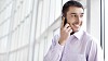 Businessman on the phone by the window