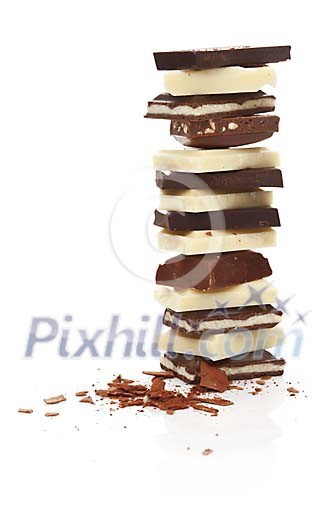 Tower made of different chocolate pieces Tower made of different chocolate pieces